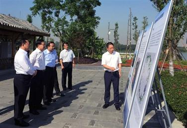 四川省委书记王东明实地调研企业承建的青龙湖湿地公园产品